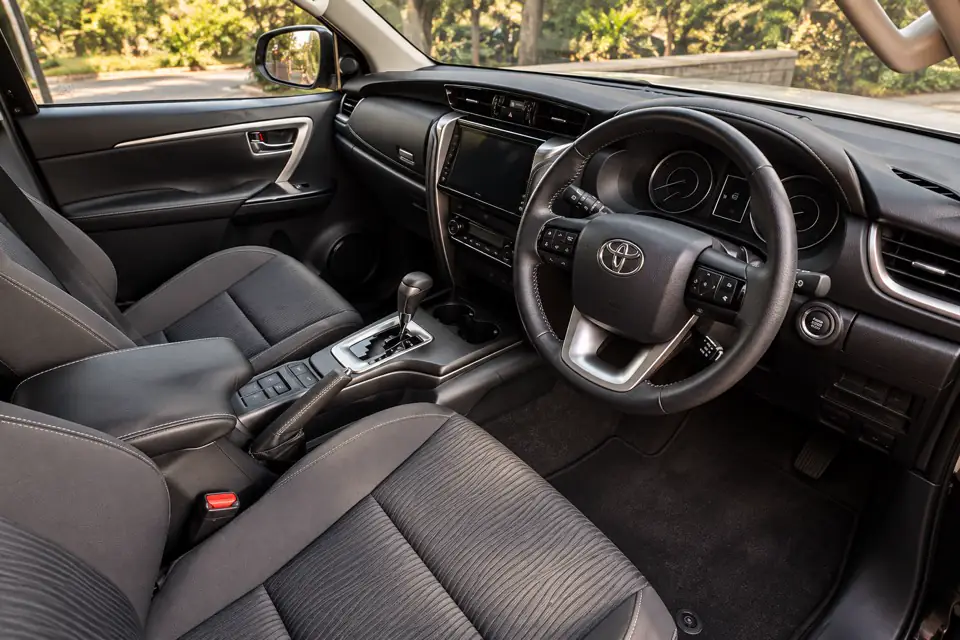 Black cabin interior of the Fortuner