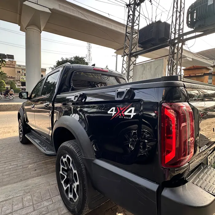 Rear view of the black JAC T9 Hunter